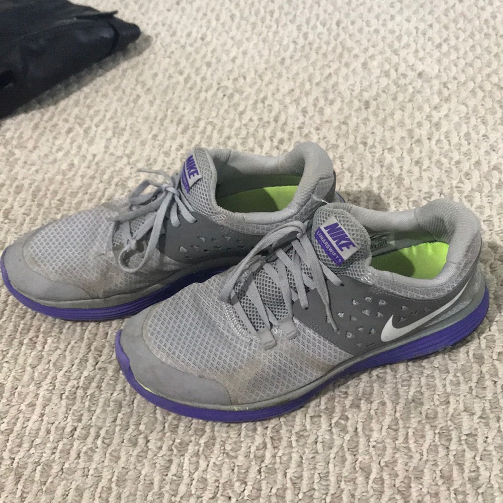Grey and purple Nike running shoes
